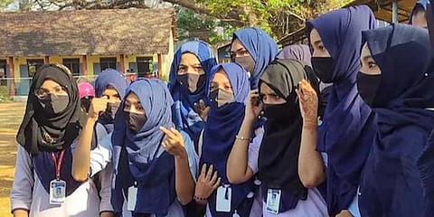 Muslim girl students, who tried to enter a government pre-university college at Kundapur in Karnataka's Udupi district wearing hijabs, were denied entry to the premises. (Photo | PTI)