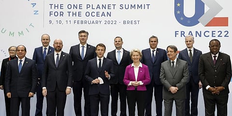 France's President Emmanuel Macron, center left, poses with heads of states for a picture before the Hight Level Segment session of the One Ocean Summit.(Photo | AP)