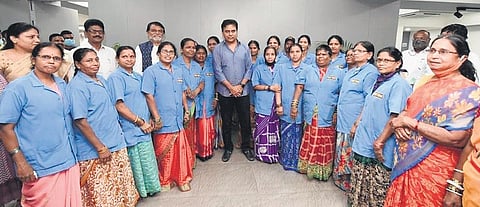 MAUD Minister K T Rama Rao poses for a picture along with outsourced staff of the HMDA after chairing a review meeting in Hyderabad on Friday