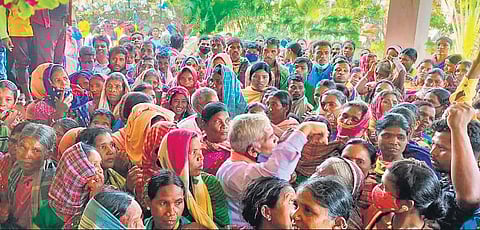 BJP workers staging protest near Jharigaon police station on Friday. (Photo | Express)