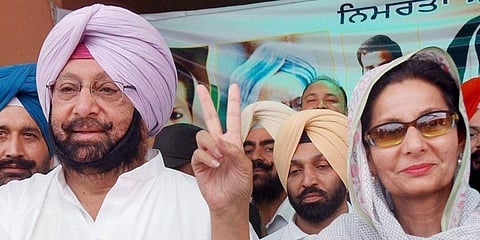 Former Punjab CM Amarinder Singh and Congress MP Preneet Kaur (File Photo | PTI)