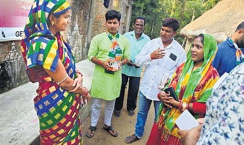 Candidates seeking votes from villagers in Dhinkia | Express