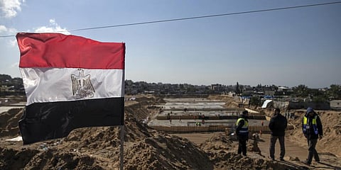 Laborers work on concrete slab foundations for one of three Egyptian-funded housing complexes in the Gaza Strip.(File Photo | AP)