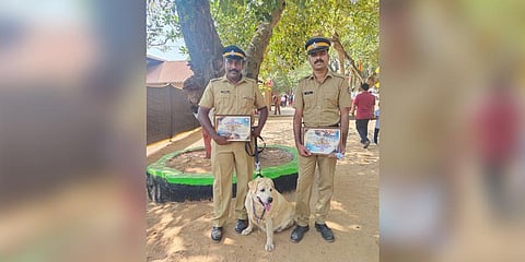 Jerry with her handlers Vishnu Sankar V S and Anoop M V