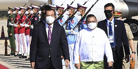 Cambodian Prime Minister Hun Sen, left, reviews an honor guard with Myanmar Foreign Minister Wunna Maung Lwin, front right.(File Photo | AP)