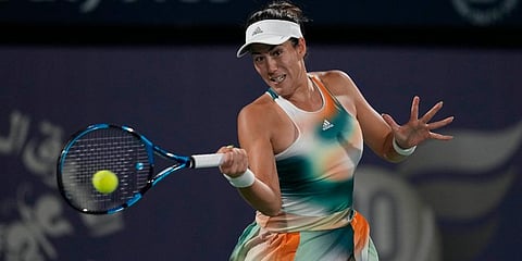 Garbine Muguruza returns the ball to Katerina Siniakova during a match of the Dubai Duty Free Tennis Championship in Dubai, UAE. (Photo | AP)