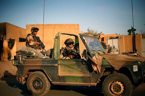 French soldiers secure the evacuation of foreigners during exchanges of fire with jihadists in Gao, northern Mali ( Photo | AP)