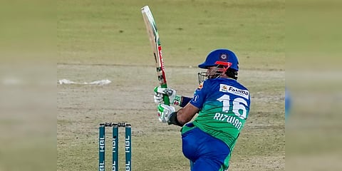 Multan Sultans skipper Muhammad Rizwan scores a boundary amid his innings of 76 against Karachi Kings in a PSL 2022 match. (Photo| Twitter)