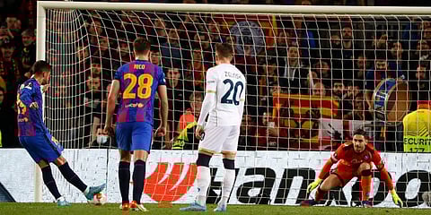 Barcelona's Ferran Torres, left, scores on a penalty kick during the Europa League soccer match between Barcelona and Napoli in Barcelona, Spain, Thursday, Feb. 17, 2022. (Photo | AP)