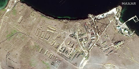 This Feb. 15, 2022 satellite image provided by Maxar Technologies shows military equipment positioned in convoy at Lake Donuzlav in Crimea. (Photo | AP)