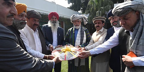 PM Narendra Modi with Sikh-Hindu delegation from Afghanistan. (Photo| Twitter)