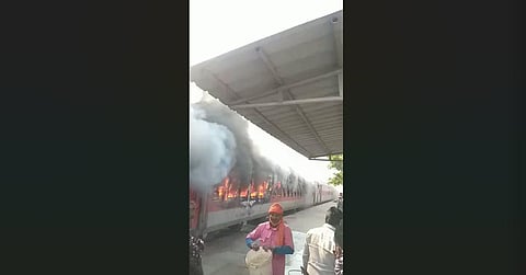 Coaches of Swatantrata Senani Express catching fire at Madhubani station in Bihar on Saturday, Feb 19, 2022. (Photo | Express)