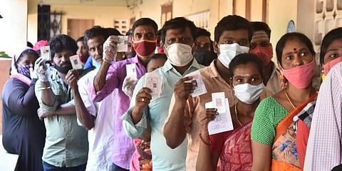 Voters wait in queue to cast their vote at North Chennai, during the Urban and local body elections. (Photo | EPS)