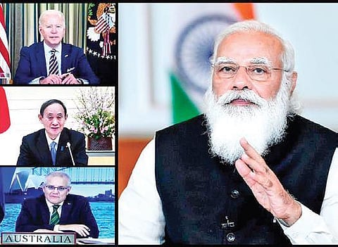 PM Narendra Modi interacts with US President Joe Biden, Japanese PM Yoshihide Suga, Australian PM Scott Morrison at the Quad summit ( File Photo| Twitter)