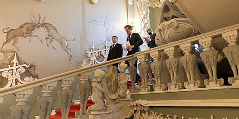 Ukrainian President Volodymyr Zelenskyy, left, and Prime Minister of the Netherlands Mark Rutte step down the stairs to attend a joint news conference in Kyiv, Ukraine, Feb 2, 2022. (Photo | AP)