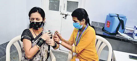 Of the target of 21 lakh beneficiaries eligible for the booster dose, 11 lakh (11,24,096) beneficiaries have received the third dose (Photo| EPS)