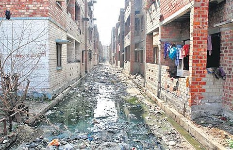 Thieves are damaging buildings and stealing iron rods from walls at Rajiv Ratan Awas Township in Bawana (Photo | EPS, Shekhar Yadav)