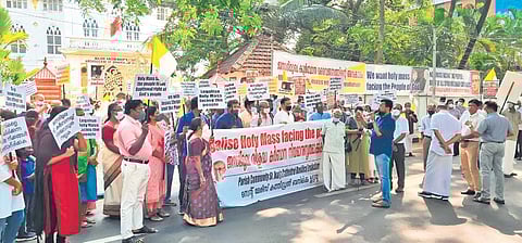 Parishioners of St Mary’s Basilica Church gather in front of the Bishop’s House expressing solidarity with Metropolitan Vicar Mar Antony Kariyil on Sunday ( Photo | EPS)