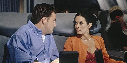 Matthew Perry (L) and Courteney Cox in a still from 'Friends'. (Photo| IMDb)
