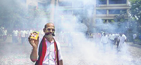 Crackers and sweets mark celebration at the DMK office