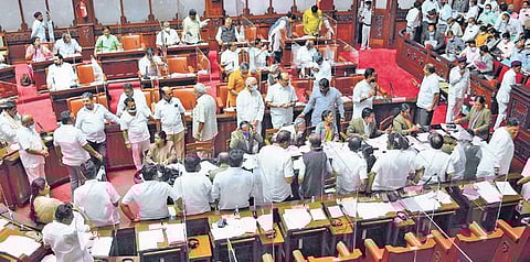 Congress MLCs protest in the well of the House on Monday | nagaraja gadekal
