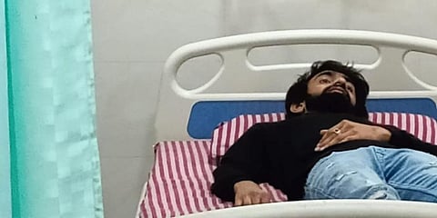Shifa's brother Saif at the hospital after being attacked by a mob at his father's restaurant