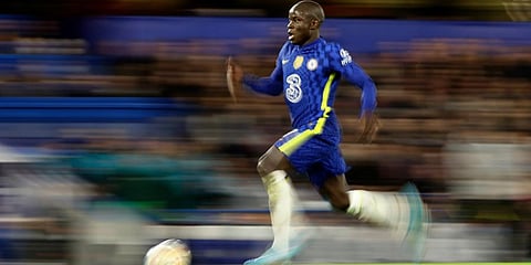 Chelsea's N'Golo Kante runs with the ball during their Champions League round of 16, first leg, match against LOSC Lille at Stamford Bridge stadium in London, Feb. 22, 2022. (Photo | AP)