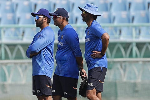 India's captain Rohit Sharma, left, head coach Rahul Dravid, center, and batting coach Vikram Rathour watch players train during a practice session. (Photo | AP)