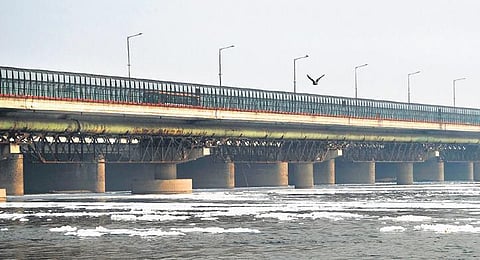 Toxic foam floats in the Yamuna river at ITO bridge. (Photo | Express)
