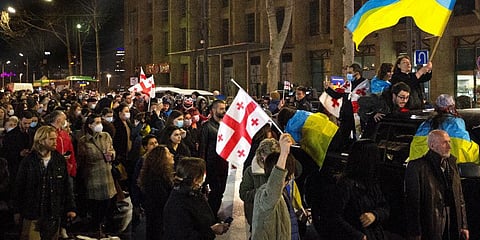 People including Ukrainians, take part in a demonstration in support of Ukraine, in the center of Tbilisi, Georgia. (Photo | AP)