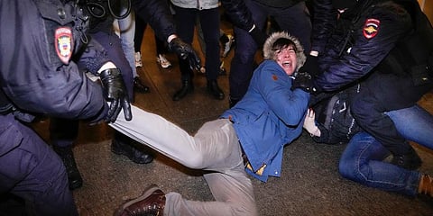 Police officers detain demonstrators in St. Petersburg, Russia. (Photo | AP)