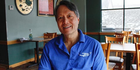Charles Yee sits in his restaurant, Emperor's Kitchen, in Brookfield, Wis. (Photo | AP)