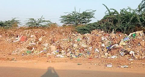 Kurnool Municipal Corporation began ground levelling at Joharapuram old dump yard on Saturday. (Photo | EPS)