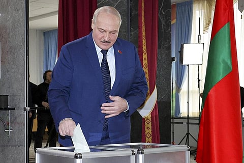 Belarusian President Alexander Lukashenko casts his ballot at a polling station during the referendum on constitutional amendments in Minsk, Belarus. (Photo | AP)