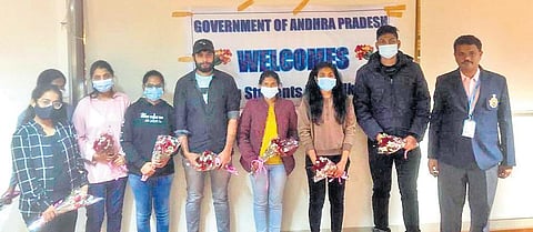 Ten students , among the first group of evacuees from Ukraine, after landing at Mumbai airport. (Photo | EPS)