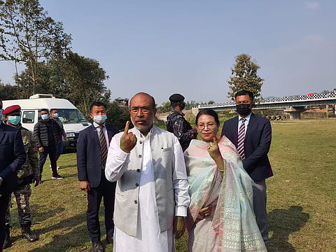 Manipur CM N Biren Singh and his wife pose for camera after casting votes on Monday. (Photo | Twitter)
