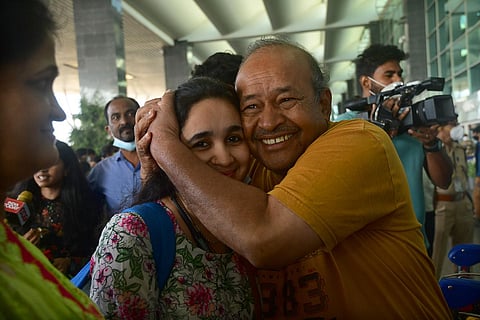 The first batch of 17 students from Karnataka, who were stranded in Ukraine, landed at the Kempegowda International Airport in Bengaluru on Sunday, Feb 27, 2022. (Photo | Ashishkrishna HP, EPS)
