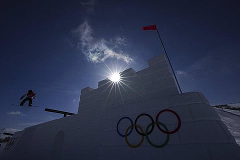 A snowboarder catches air on the slopestyle course ahead of the 2022 Winter Olympics, Thursday, Feb. 3, 2022, in Zhangjiakou, China. (Photo | AP)