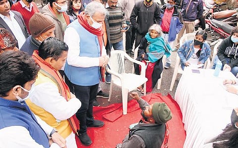 BJP chief Adesh Gupta interacts with a participant. (Photo | Express)