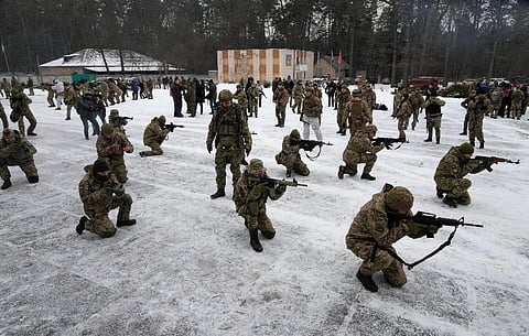 Members of Ukraine's Territorial Defense Forces, volunteer military units of the Armed Forces, train close to Kyiv, Ukraine. (Photo | AP)
