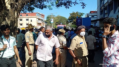 Police stood as guard to disperse the students at RN Shetty PU College in Kundapur for creating trouble by wearing saffron shawl on Saturday. (Photo | Express)