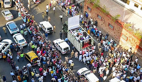 People attend the funeral procession of legendary singer Lata Mangeshkar, in Mumbai, Sundy, Feb. 6, 2022. (Photo | PTI)