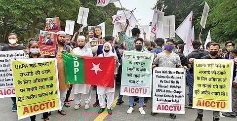 Students, activists protest outside Tripura Bhawan in New Delhi against the communal violence in Tripura. (File | PTI)