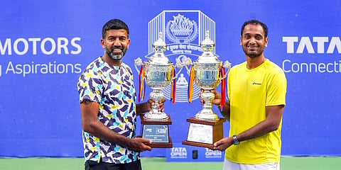Indian duo Rohan Bopanna and Ramkumar Ramanathan pose with the Tata Open Maharashtra trophy after defeating Australia's Luke Saville and John-Patrick Smith in the final, Feb 6, 2022. (Photo | PTI)