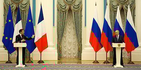 Russian President Vladimir Putin, right, listens during a joint press conference with French President Emmanuel Macron after their talks Monday, Feb. 7, 2022 in Moscow. (Photo | AP)