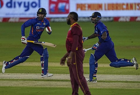 India's Deepak Hooda, left and Suryakumar Yadav score runs during the first ODI against West Indies in Ahmedabad, India. (Photo | AP)