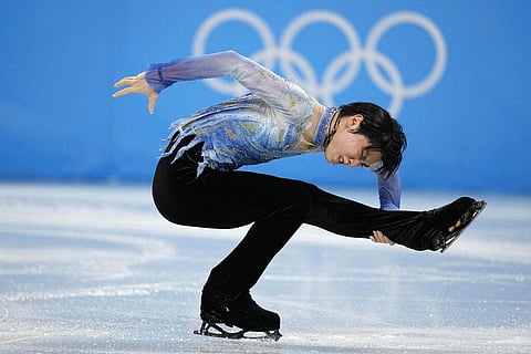 Yuzuru Hanyu, of Japan, competes during the men's short program figure skating competition at the 2022 Winter Olympics. (Photo | AP)