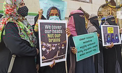 Women wearing burqa protest against the ban on headscarves, in Bengaluru. (File Photo | Vinod Kumar T, EPS)