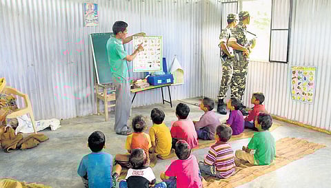 SSB jawans keep a watch at India-Nepal border from a classroom. (Photo | Vineet Upadhyay)