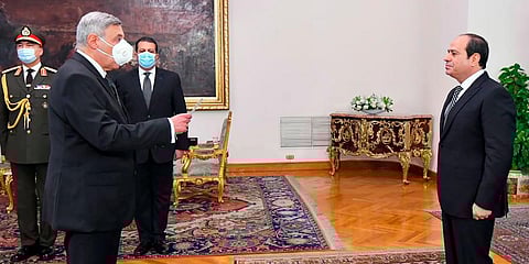 Egyptian President Abdel-Fattah el-Sissi, right, swears in Judge Boulos Fahmy, as the first-ever Coptic Christian to head the country’s highest court, in Cairo, Egypt, Feb 9, 2022. (Photo | AP)